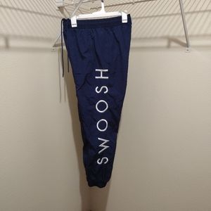 Nike men's swoosh embroidered nylon track pants size small